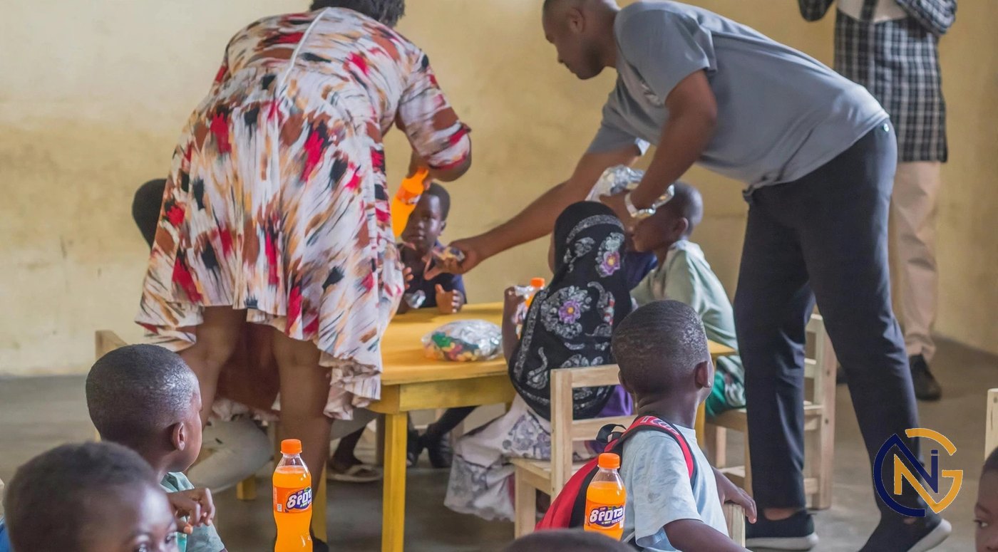 Volunteers serving children at an outreach event